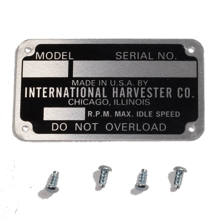 International Harvester Co. serial number identification tag with four mounting screws.