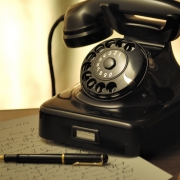 Rotary phone with fountain pen and paper