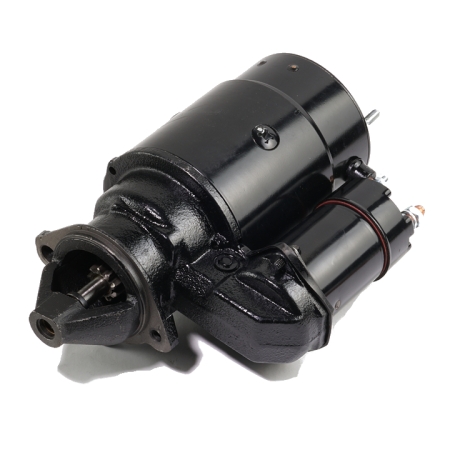 Black Delco starter motor with attached solenoid and 3-bolt mounting flange.